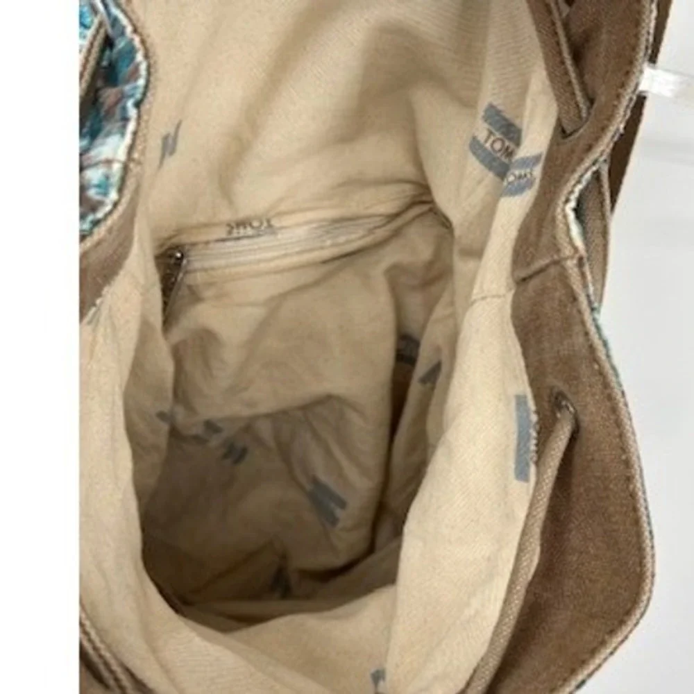 TOMS Ikat Southwestern Canvas Drawstring Backpack Teal Brown Boho Festival Bag